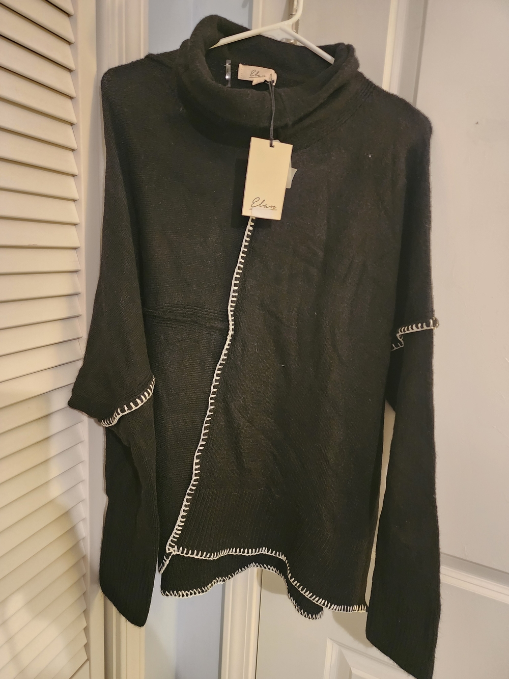 Elan Black Turtleneck Sweater with White Whipstitch Trim